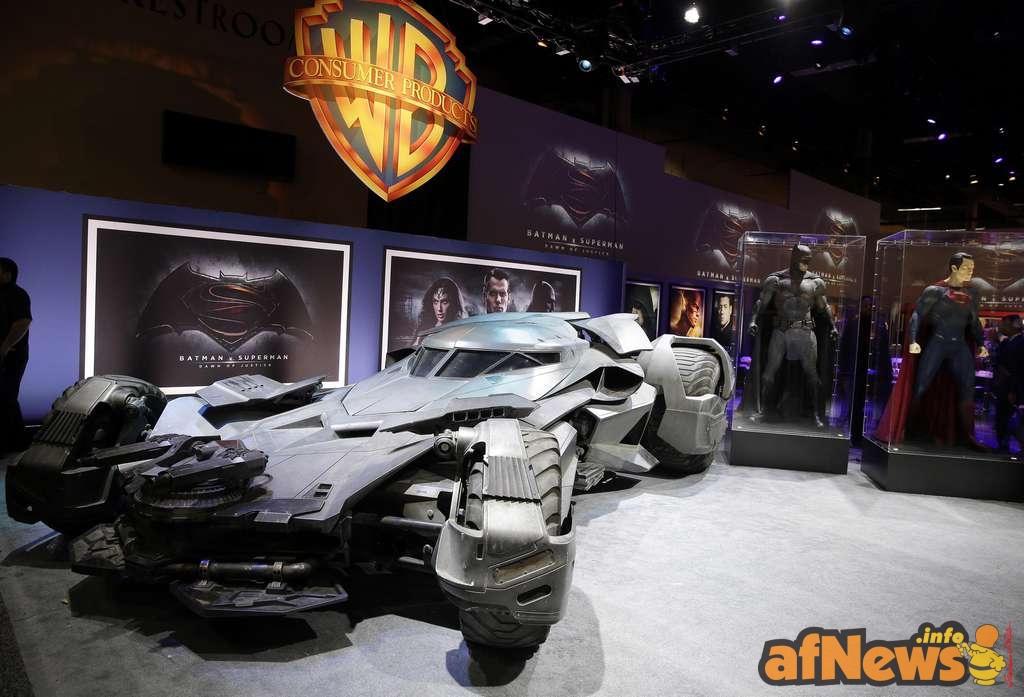 Warner Bros. Consumer Products exclusively unveils the Batmobile and select costumes from the highly anticipated film, “Batman v Superman: Dawn of Justice” at Licensing Expo 2015 on Tuesday, June 9, 2015 in Las Vegas. (Photo by Isaac Brekken/Invision for Warner Bros./AP Images)